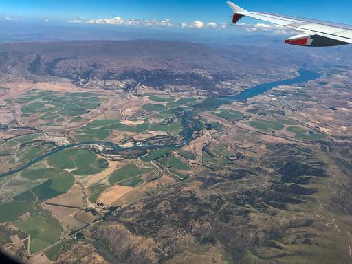 An aeroplane landing in a different country