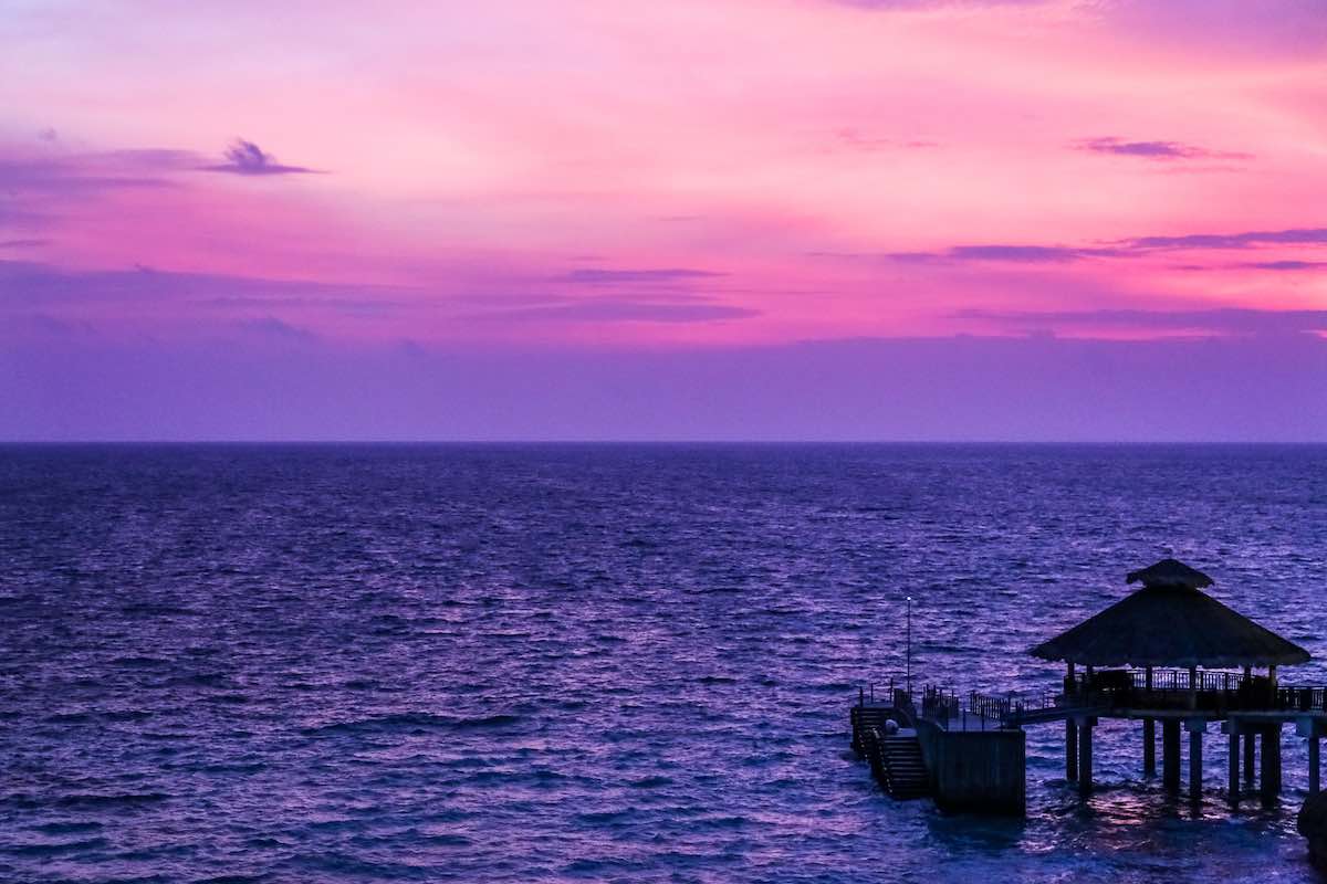 Lone Boat On A Body Of Water